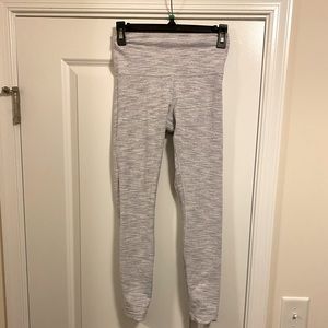 Worn twice! Lululemon white/gray striped leggings. Size 6